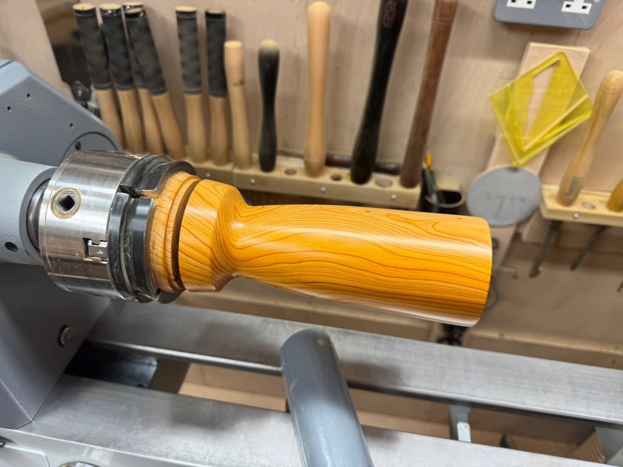 The finished vase with lacquer bringing out the grain