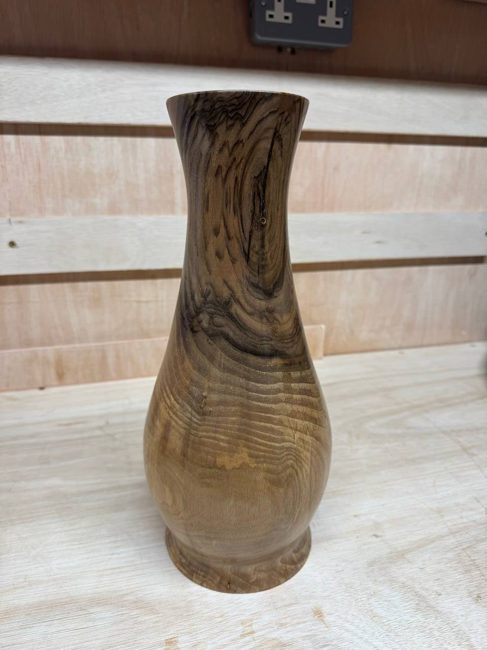The finished vase — front view showing the grain flow