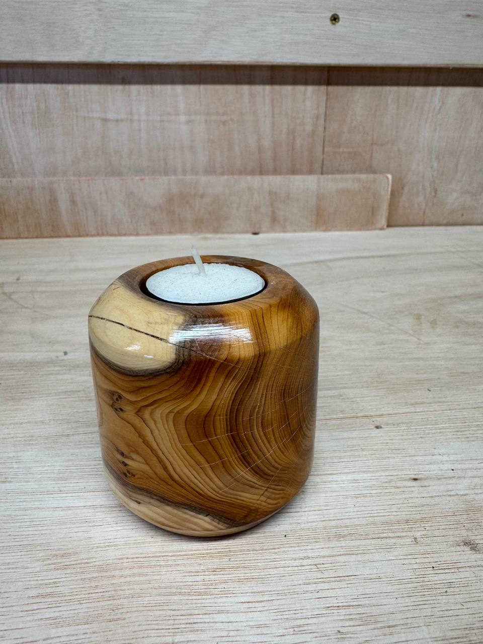 The rounder holder — showing the swirling grain pattern